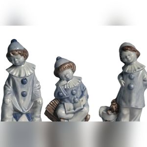 Vintage 80s blue ceramic Boy & Girl Figurines.